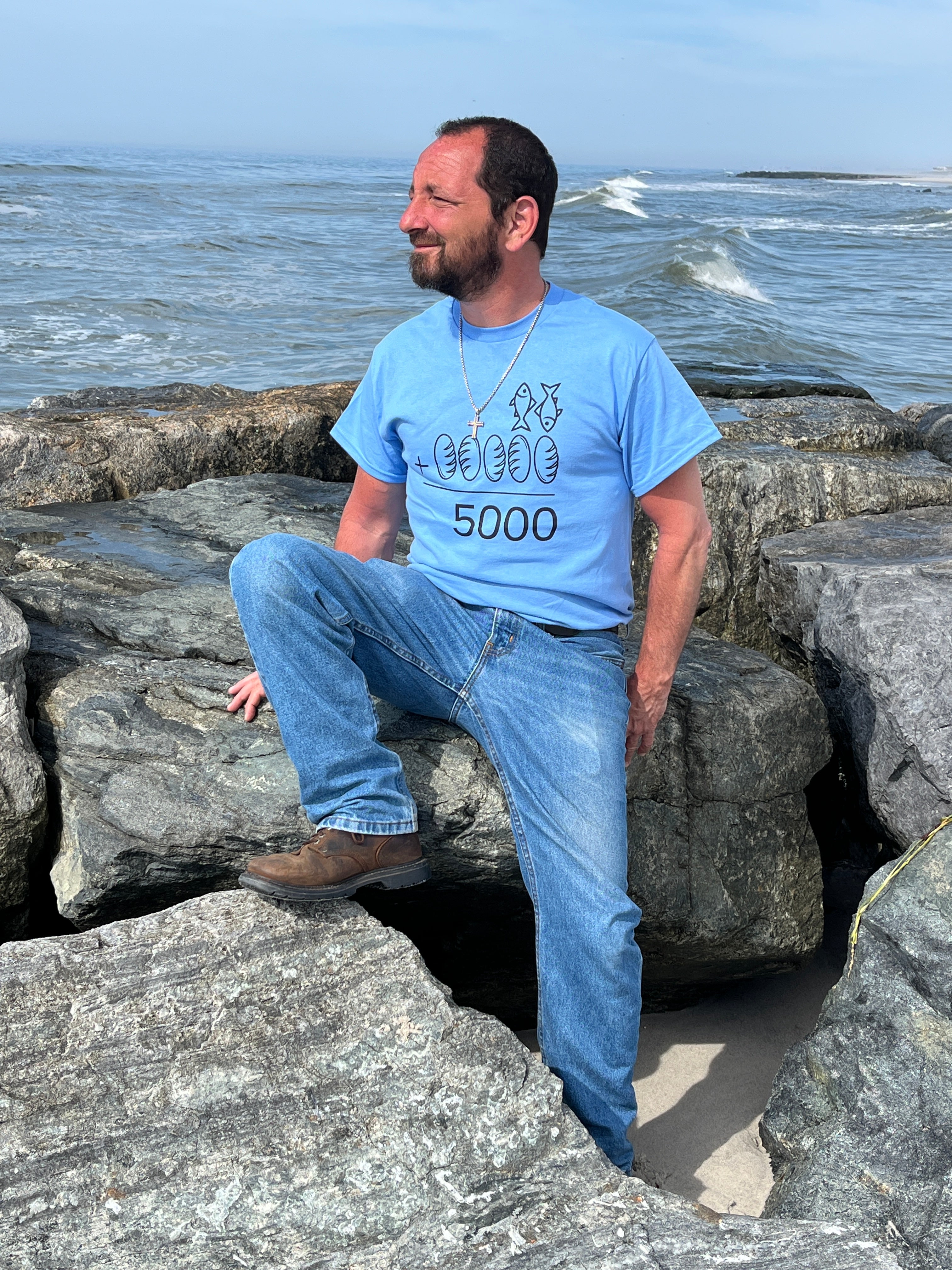 Love1614 founder Michael Maio wearing the Jesus Math Christian t-shirt on the Long Beach jetty