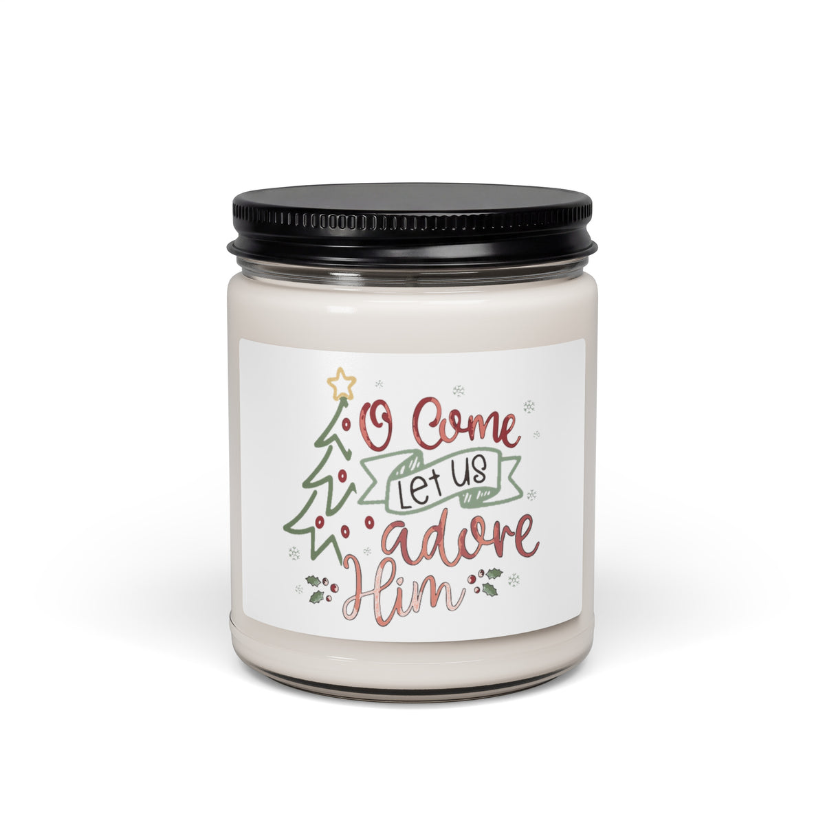 O Come Let Us Adore Him Christmas candle with black lid, front view on white background