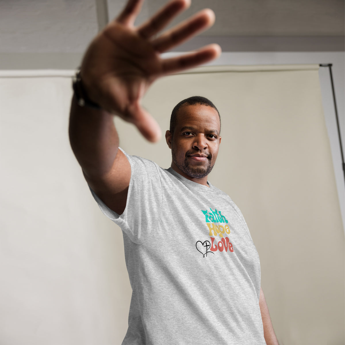 Man wearing Faith Hope Love Christian tee in white from Love1614