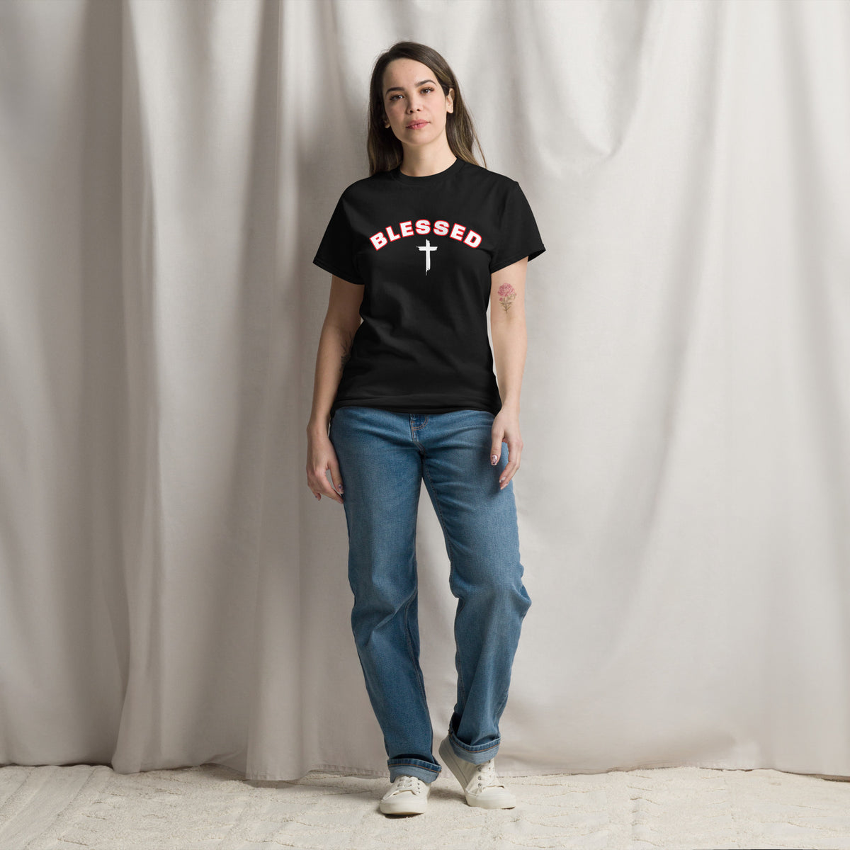 Woman wearing black Blessed Cross Christian t-shirt,  lifestyle shot