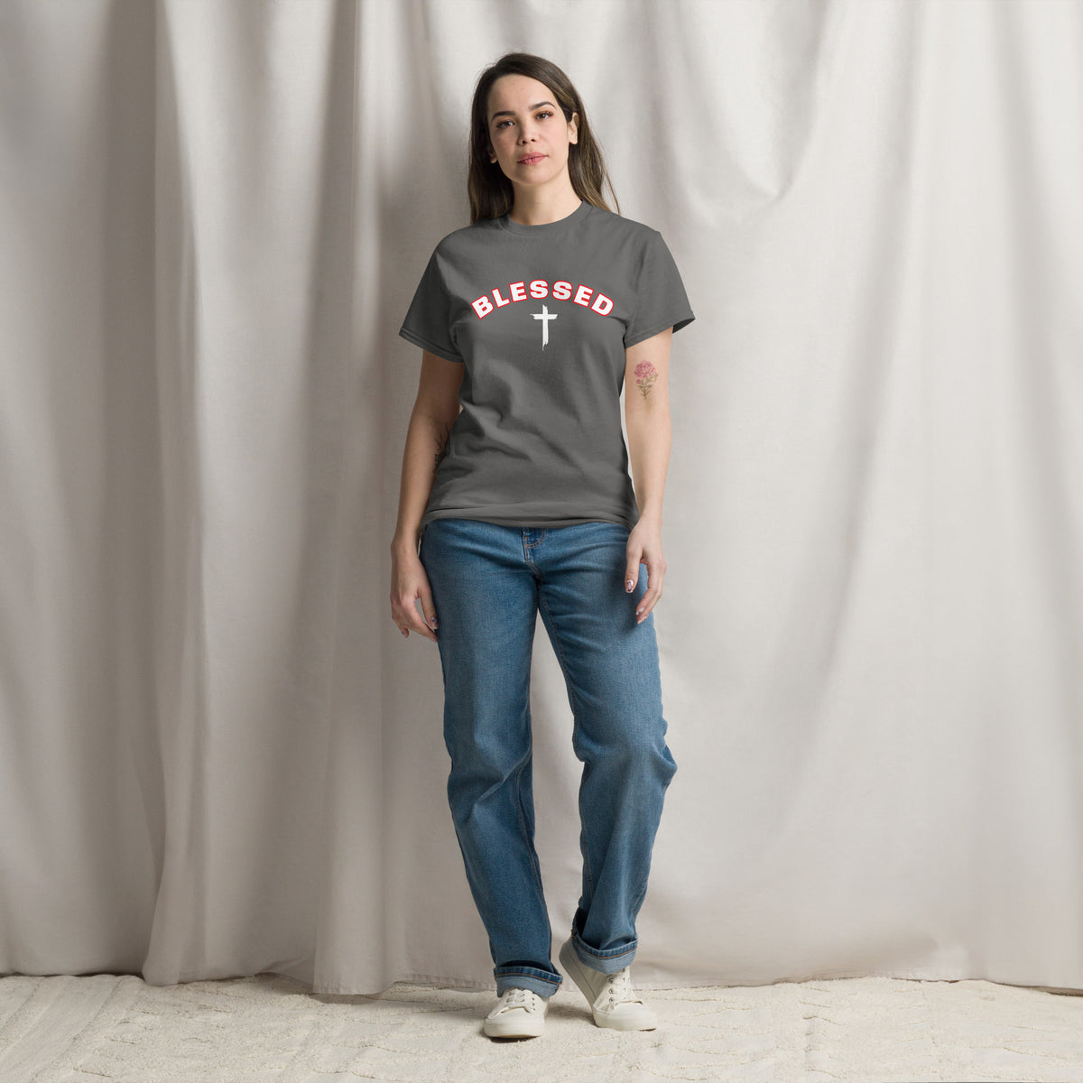 Woman wearing grey Blessed Cross Christian t-shirt, outdoor lifestyle shot