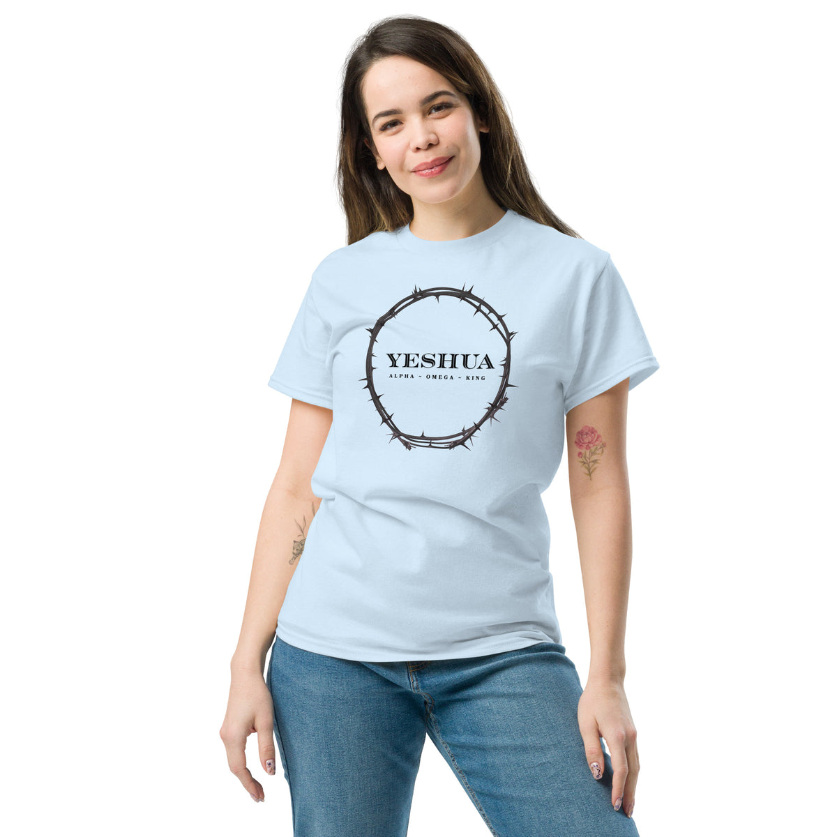 Woman wearing Yeshua T-Shirt in light blue, casual pose