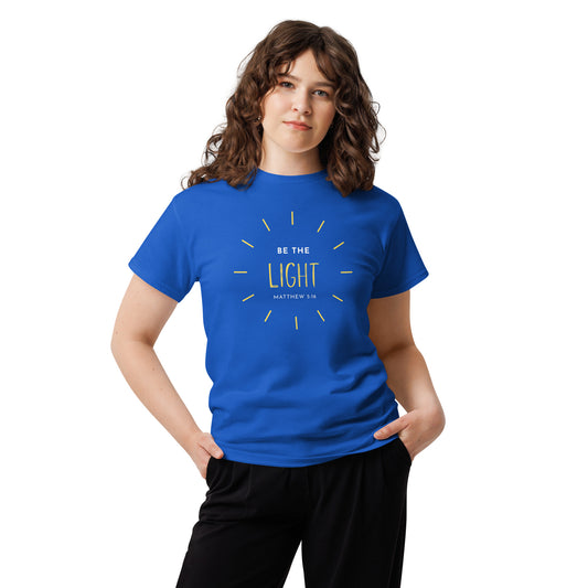 Woman wearing Be The Light T-Shirt in blue, front view