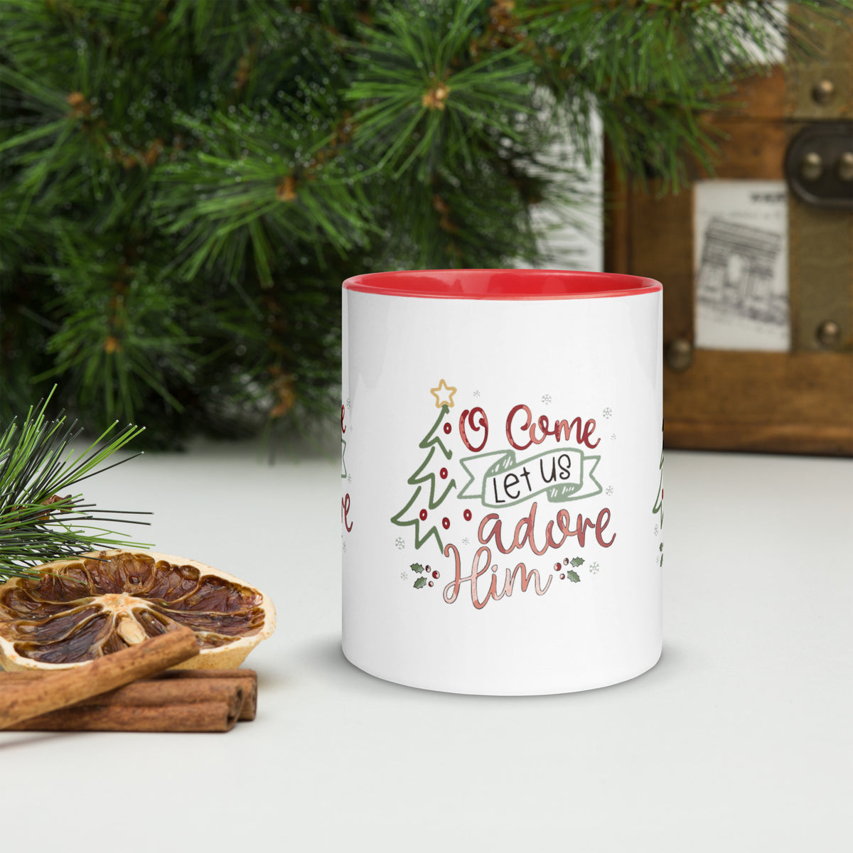O Come Let Us Adore Him Christmas Mug with red handle, Christmas scene lifestyle shot
